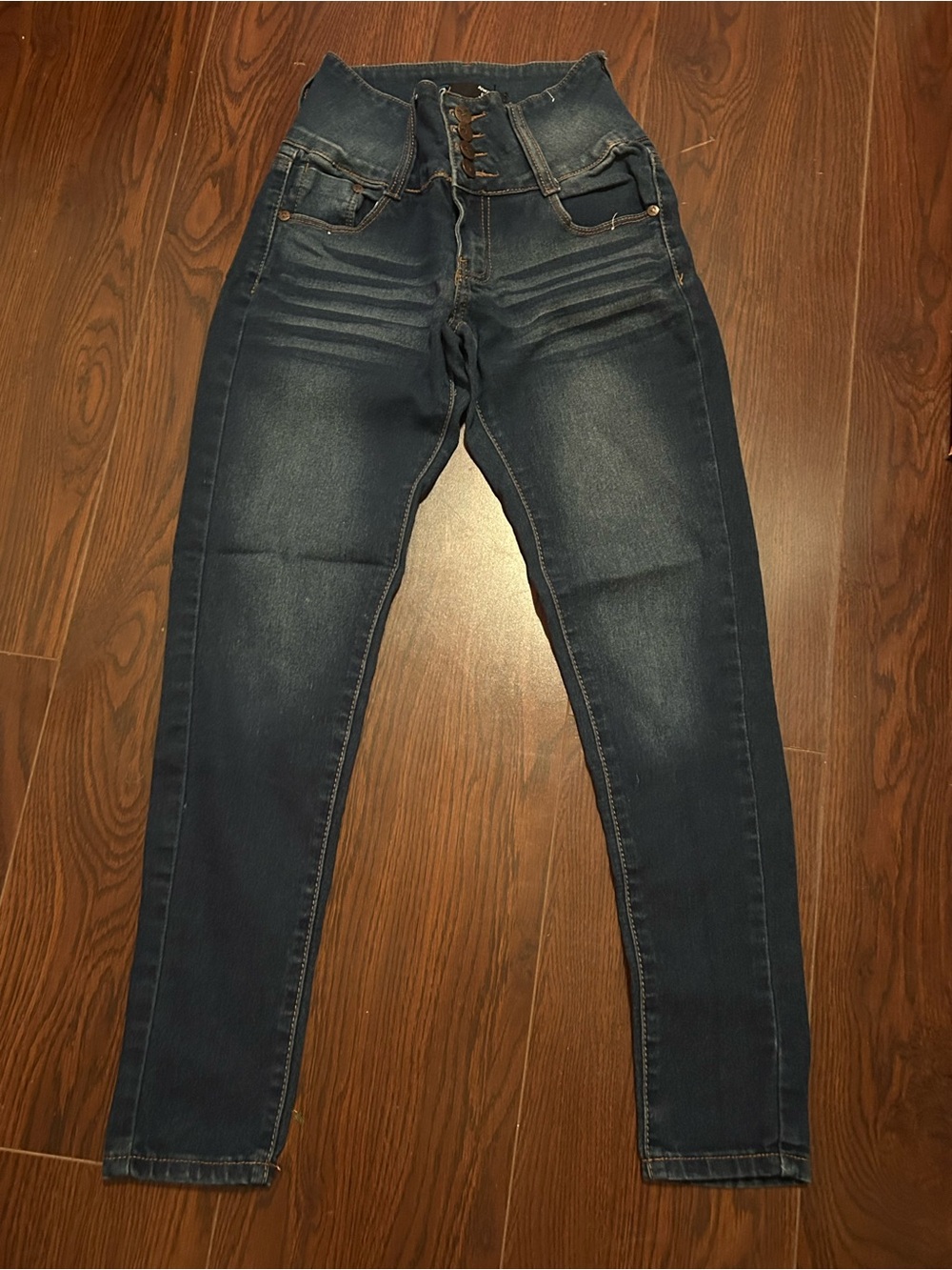 High-Rise Lace-Up Skinny Jeans in Dark Blue